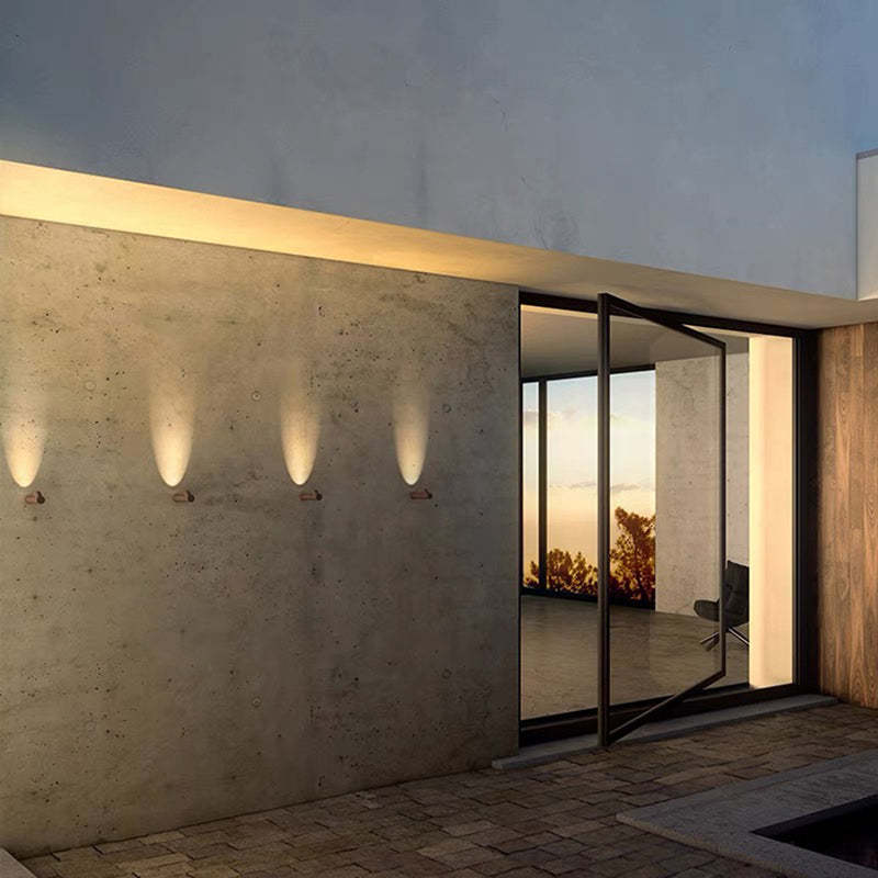 Orr Modern Outdoor Wall Lamp illuminating concrete wall