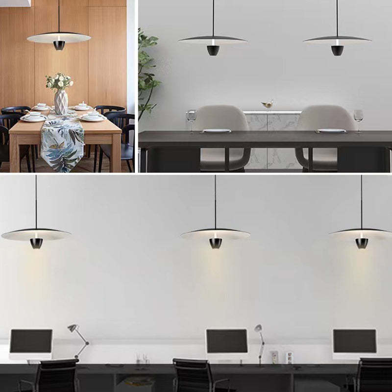 Carins pendant light in dining, office, and living spaces.