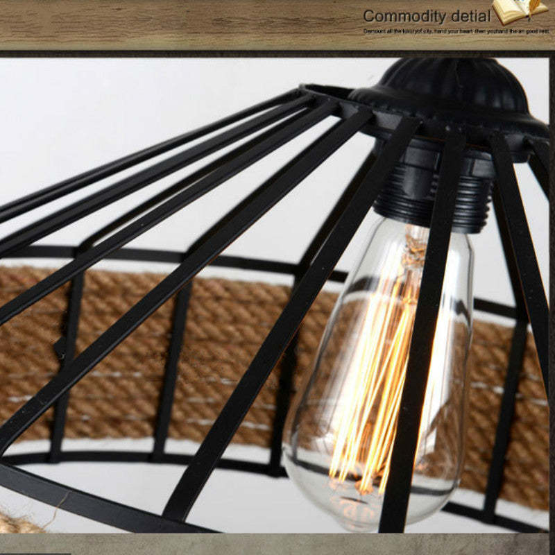 Close-up: Retro metal pendant light with rope detail.