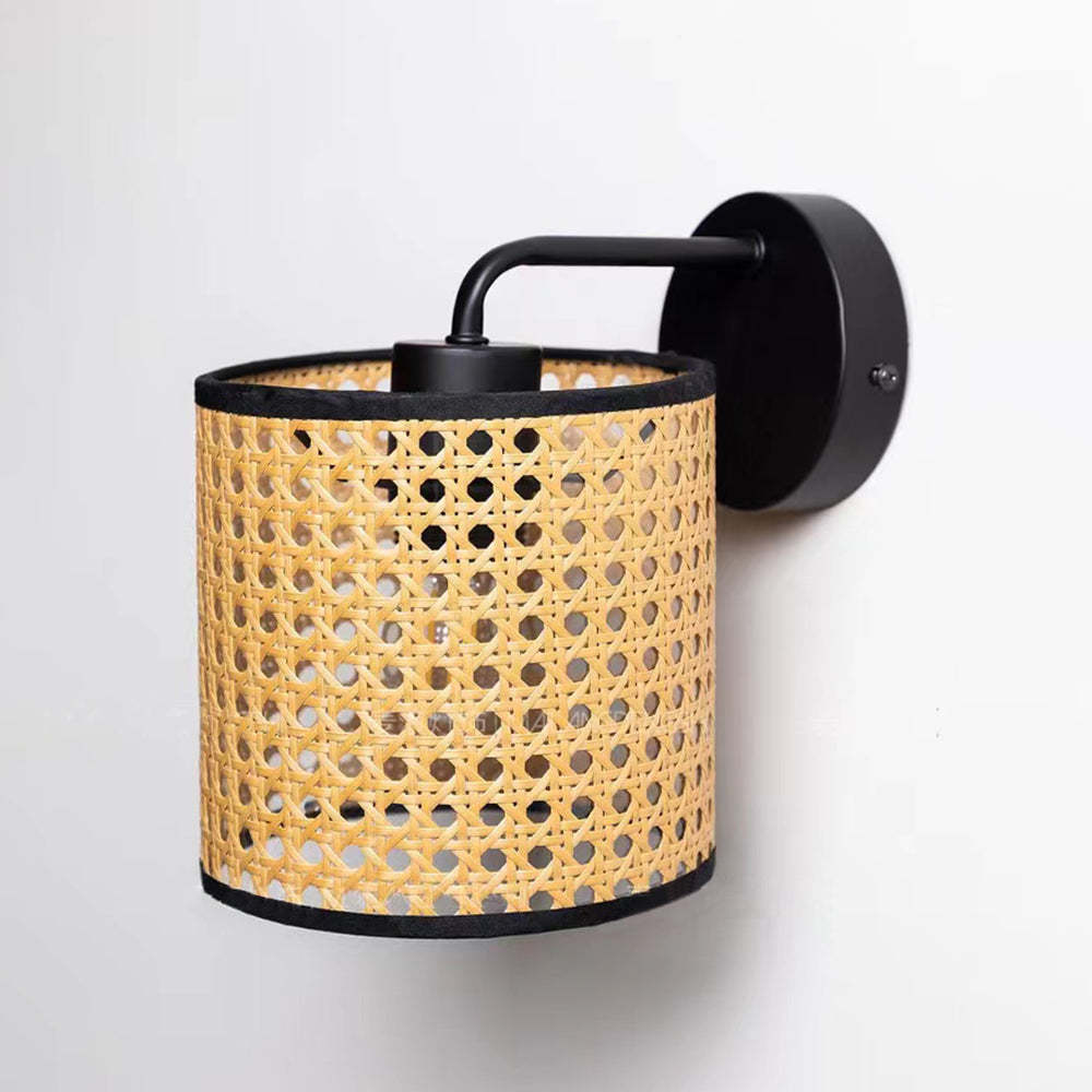 Cylindrical rattan wall lamp, black metal fixture, Lassola Ritta