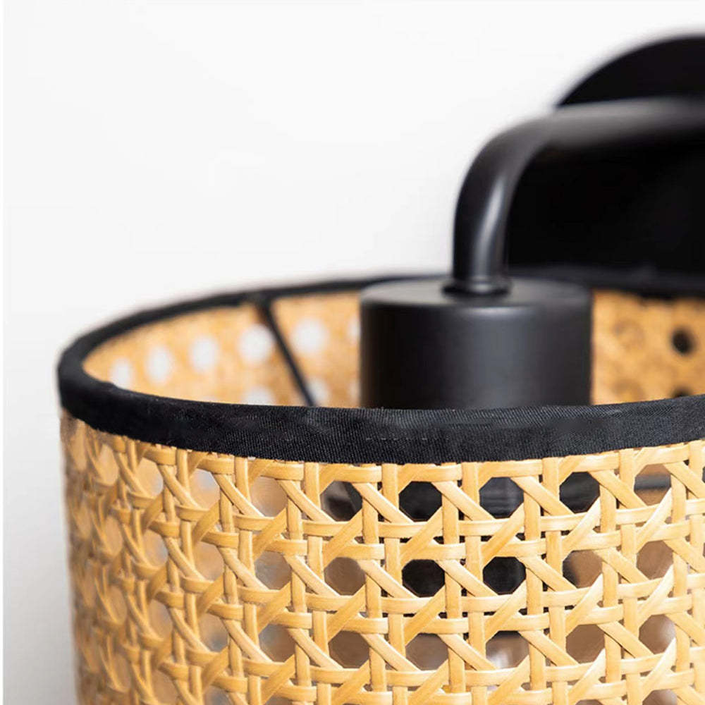 Close-up of Ritta rustic rattan wall lamp