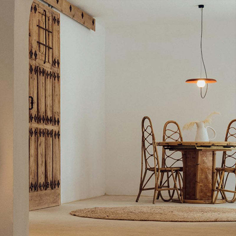 Avi Pendant Light over rustic dining set