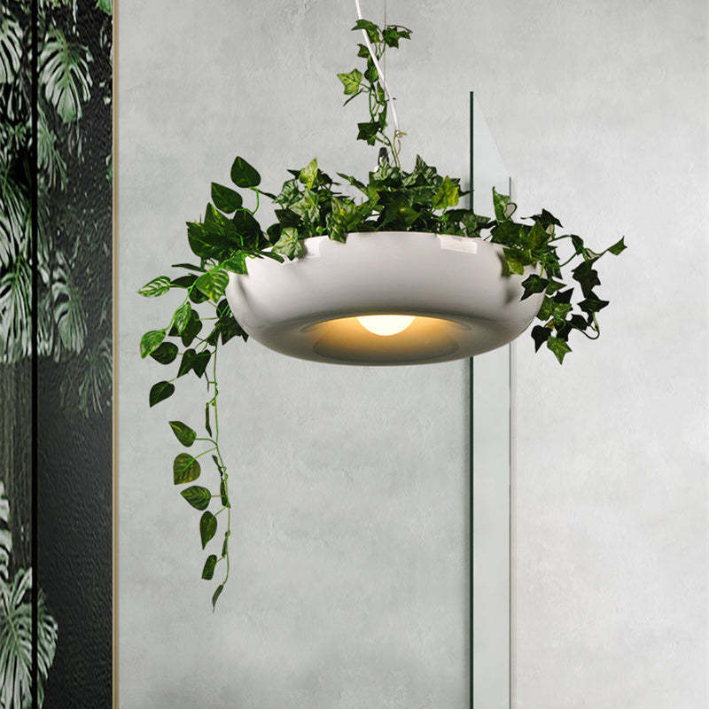 Nest pendant light with plants. Modern living room lighting fixture.