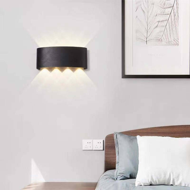 Orr modern metal wall lamp above bed