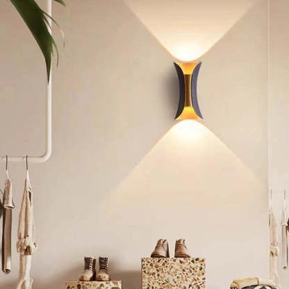 Orr LED Outdoor Wall Light with warm glow in corridor