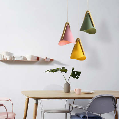 Colorful cone pendant lights in modern dining room.