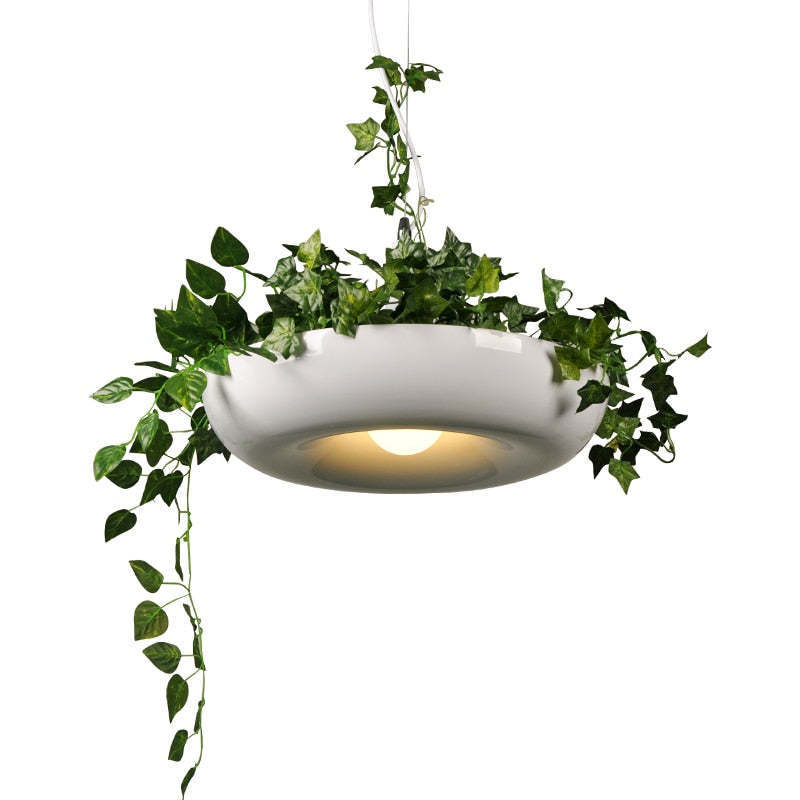 Nest pendant light with plants. Modern metal lighting fixture.