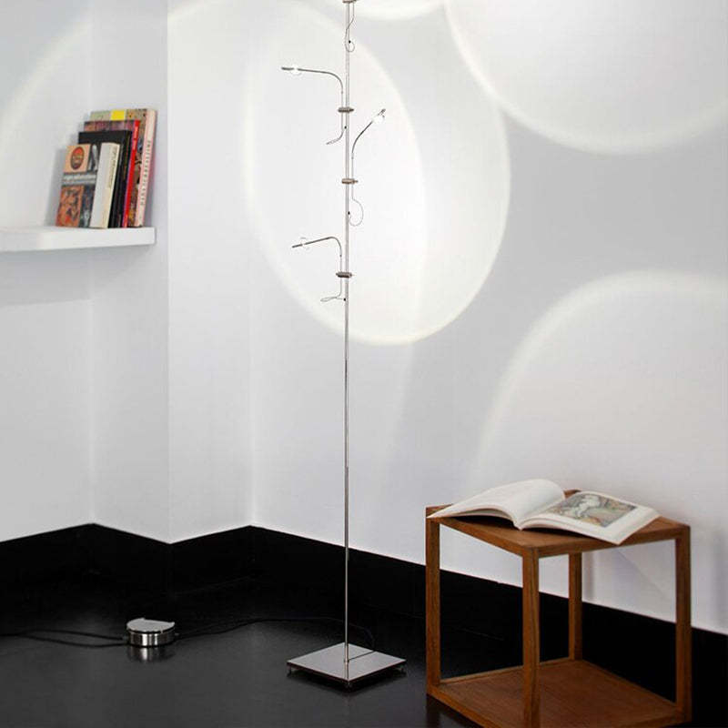 Salgado floor lamp projecting light, modern living room