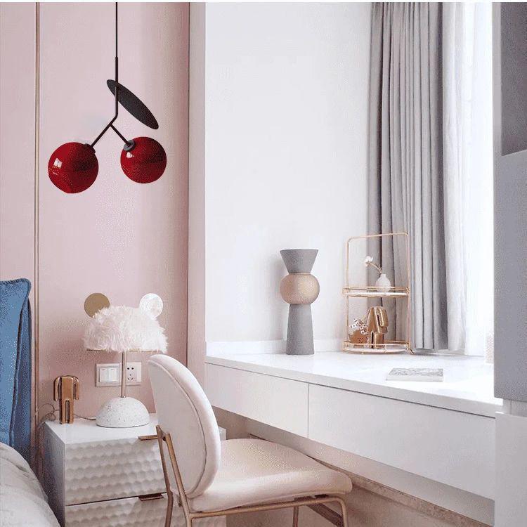 Red Valentina cherry pendant light in bedroom setting.