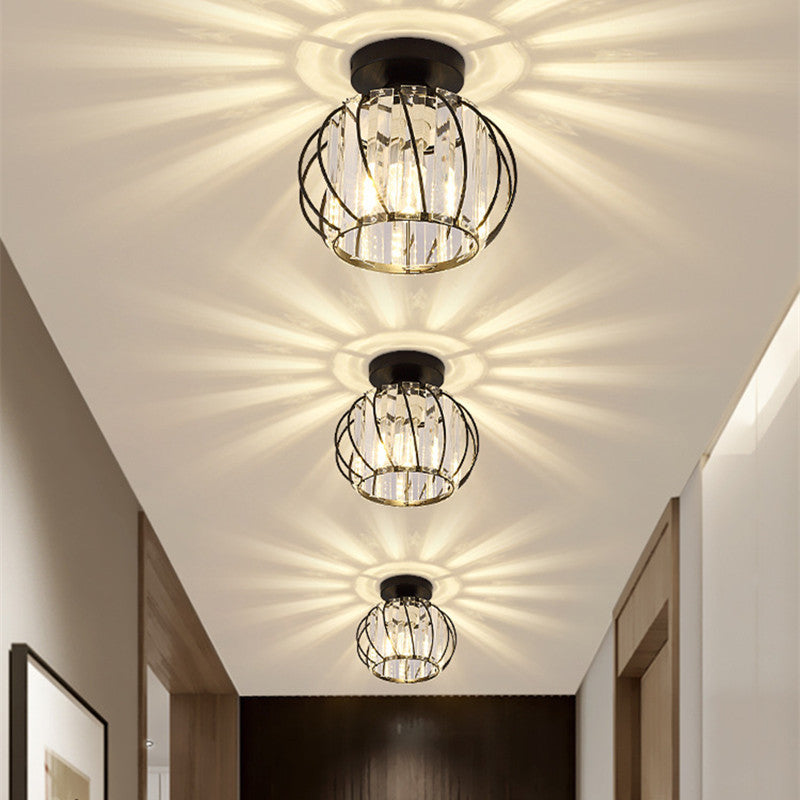 Crystal cage ceiling lights illuminating hallway