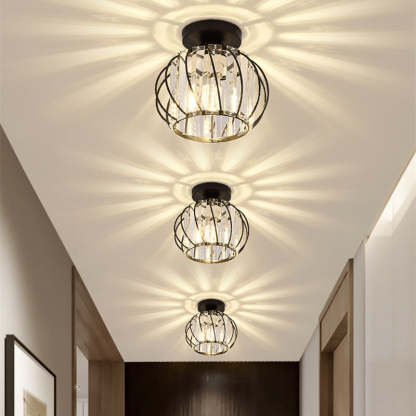 Crystal cage ceiling lights illuminating hallway