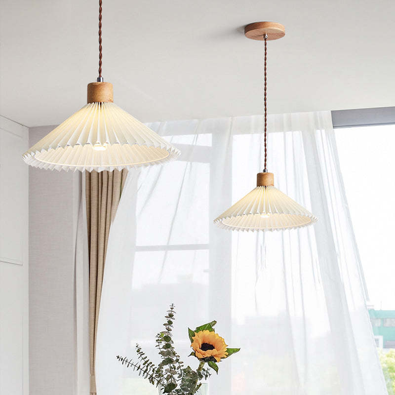 Ozawa pendant lights with origami shade near window