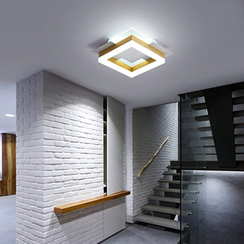 Modern square flush mount in hallway.