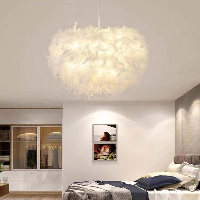 O'Moore Feather Pendant Light illuminating bedroom