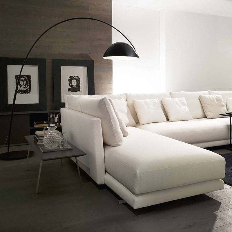 Las Sola Avi floor lamp over modern white sofa. Modern Lighting.