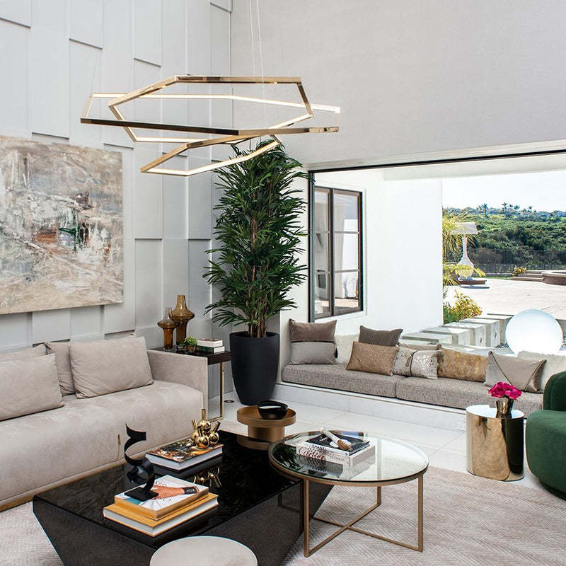 Modern living room with gold geometric pendant light