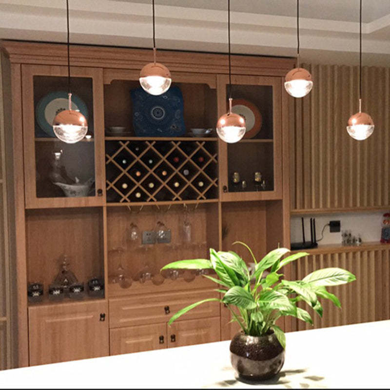 Modern kitchen with Valentina pendant lights and interior design.