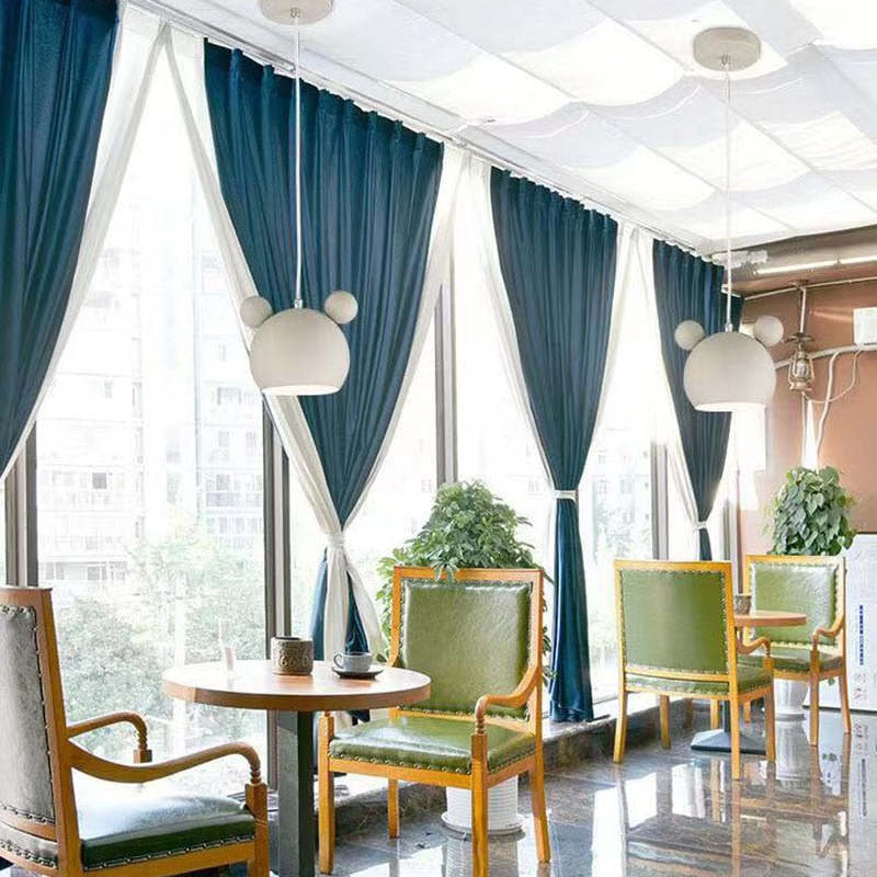 Las Sola: Cartoon pendant lights in a stylish room setting.