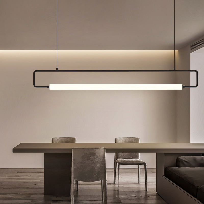 Modern rectangular LED pendant light over dining table