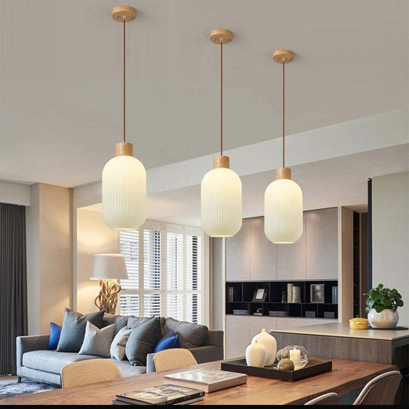 Ozawa wood glass pendant lights over dining table Ozawa Modern Wood Glass Pendant Light