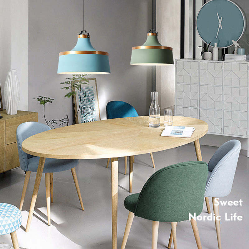 Morandi pendant lights over Nordic dining table, Las Sola