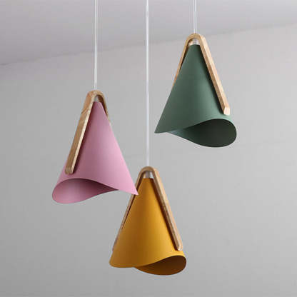 Morandi cone pendant lights in pink, yellow, and green.