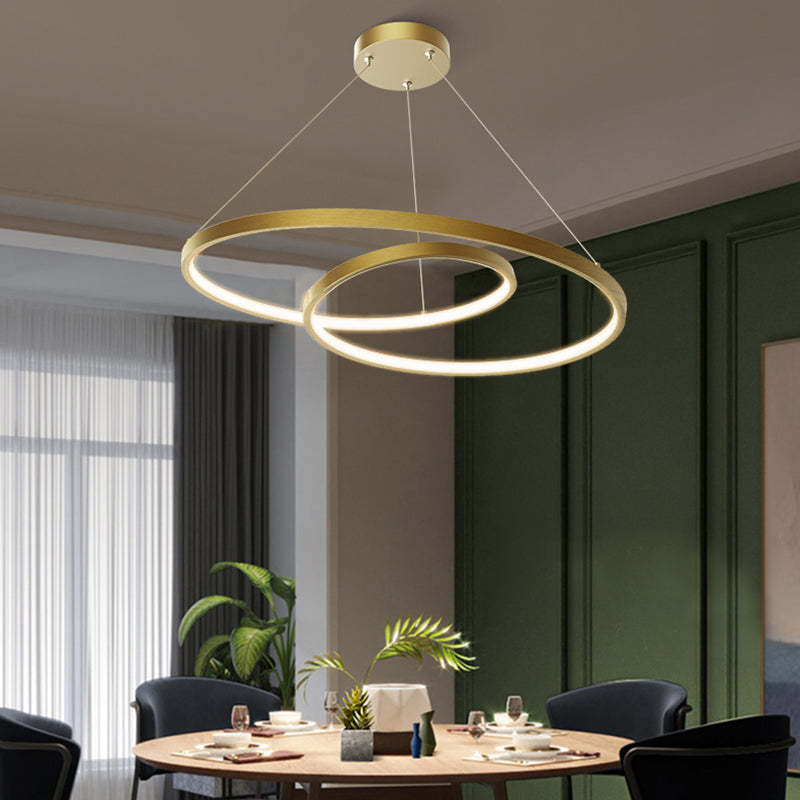 Arisha brass LED pendant light. Modern circle lighting by Las Sola.