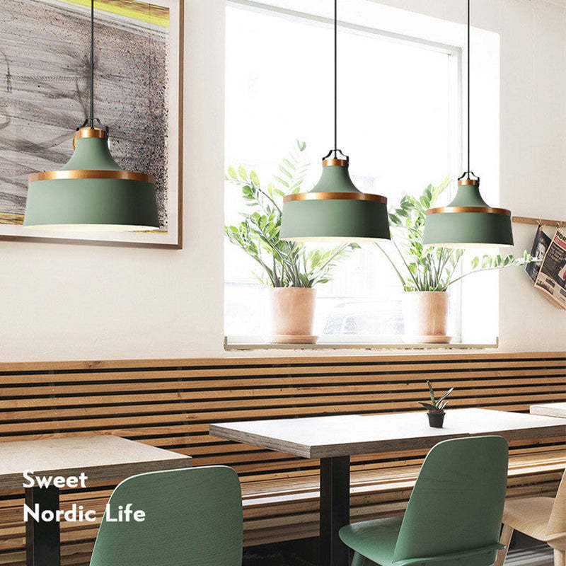 Green Morandi pendant lights in a Nordic dining space, Las Sola
