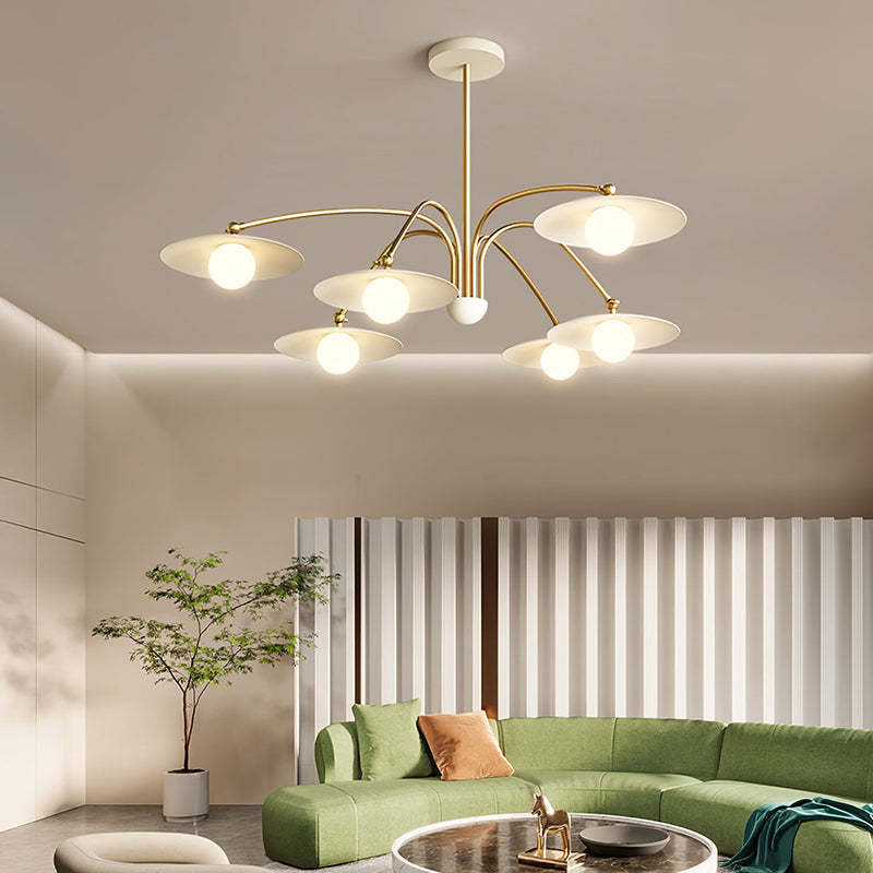 Cairns metal pendant light over green sofa, Las Sola
