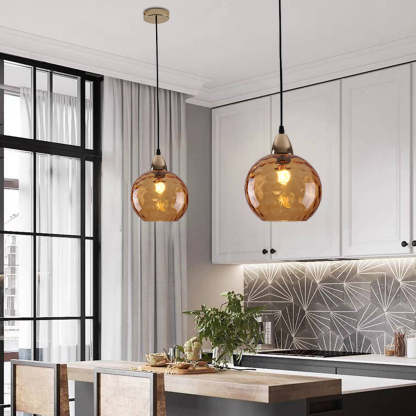 Amber Hailie glass pendant lights over kitchen island