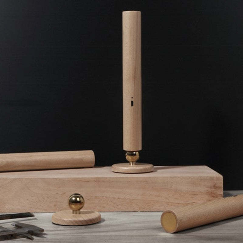 Ozawa wood wall lamp parts assembled on display.