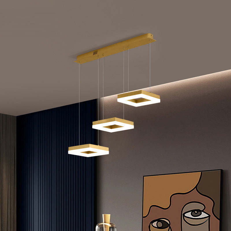 Gold square pendant light, modern minimalist design, Raheel lighting