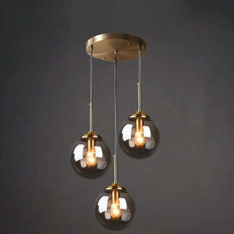 Valentina pendant light with three smoke gray glass globes