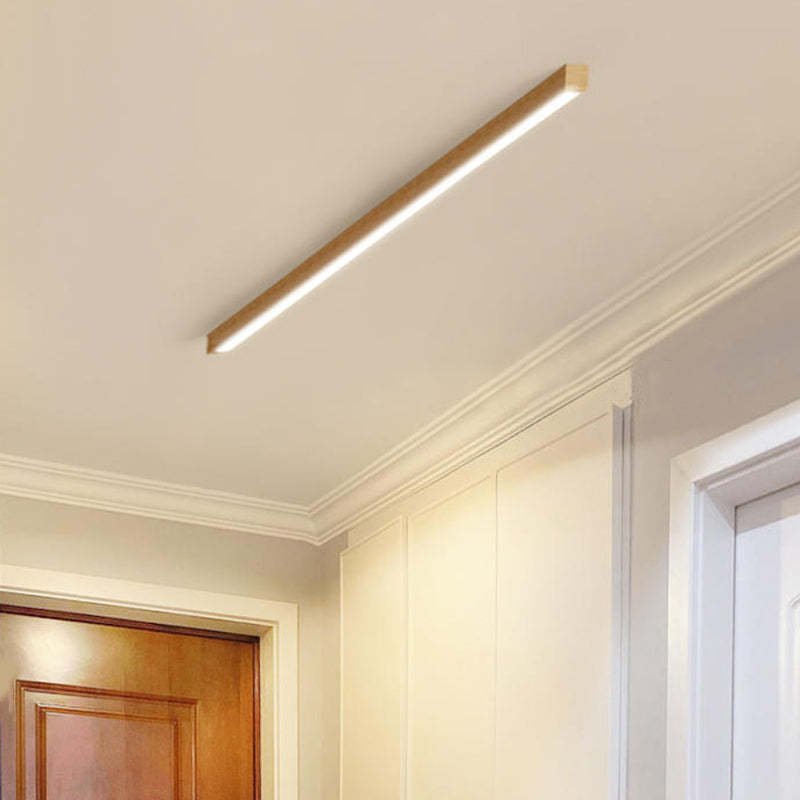 Modern wood Edge Linear ceiling light in hallway.
