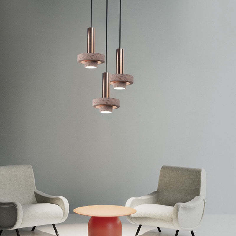 Modern pendant lights with terrazzo shades, living room setting