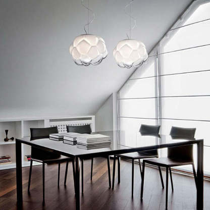 Modern cloud glass pendant lights over dining table