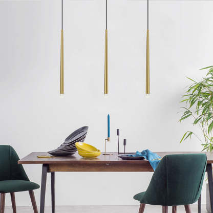 Carr gold pendant light over dining table