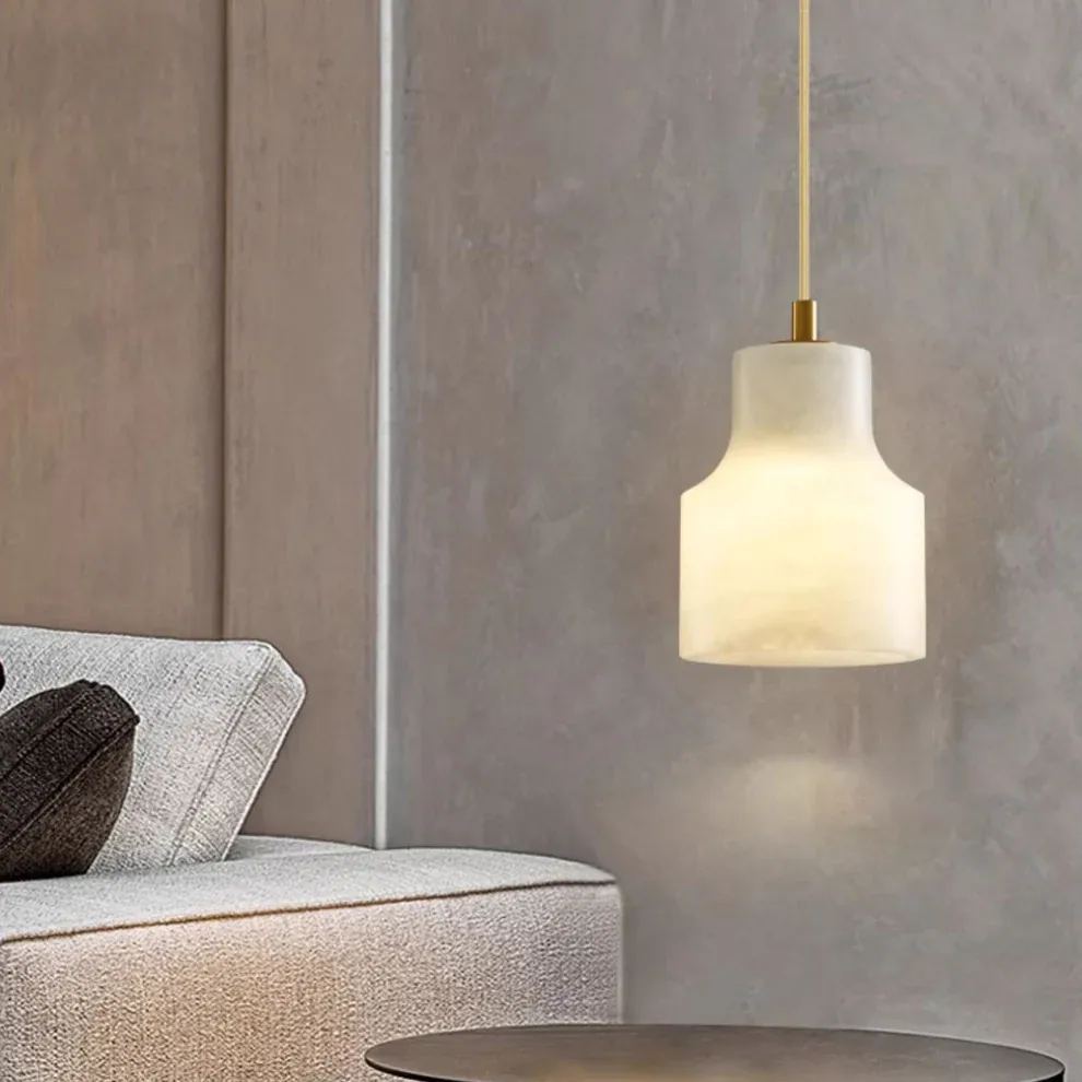 Modern resin pendant light illuminating a living room