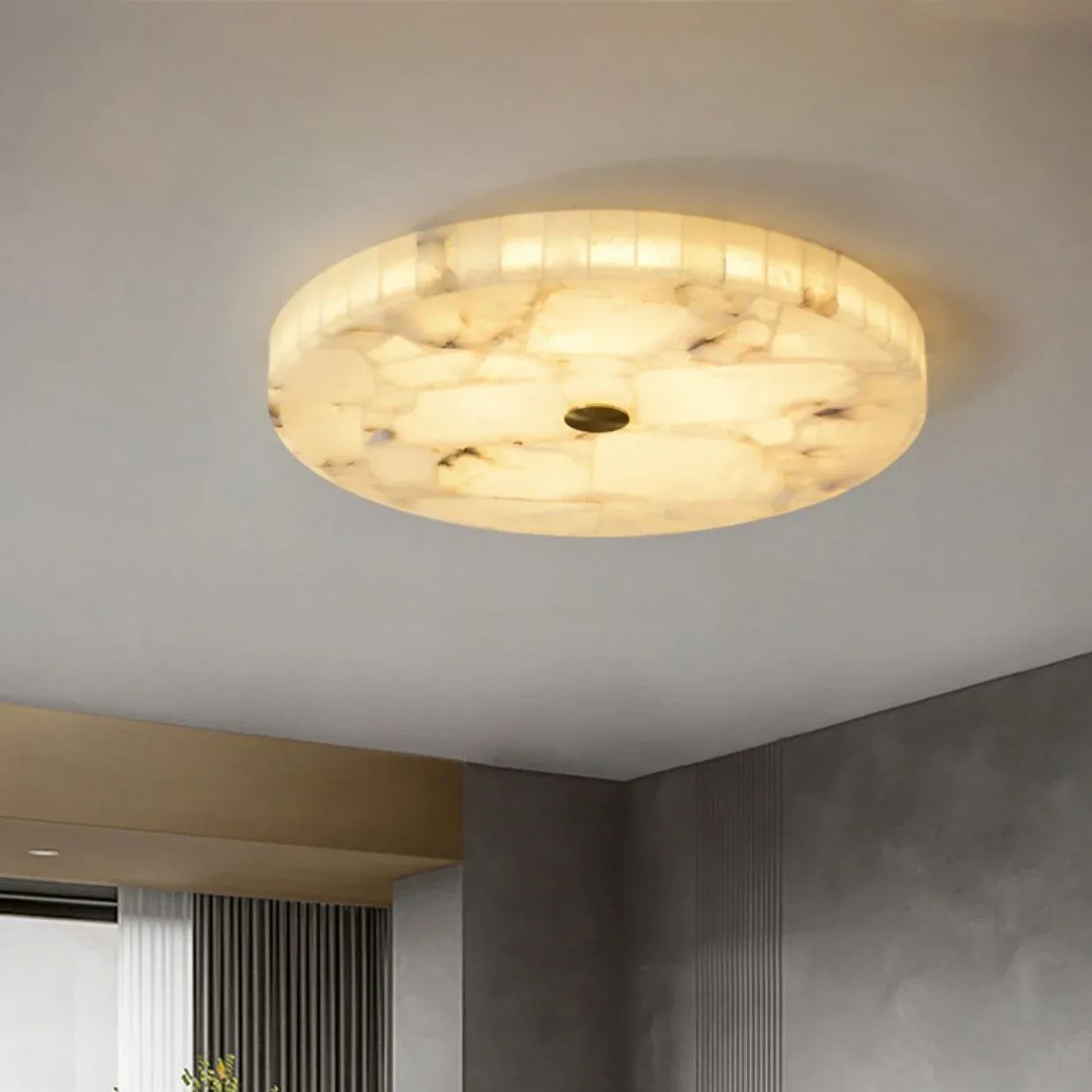 Modern minimalist round ceiling lamp in a room.
