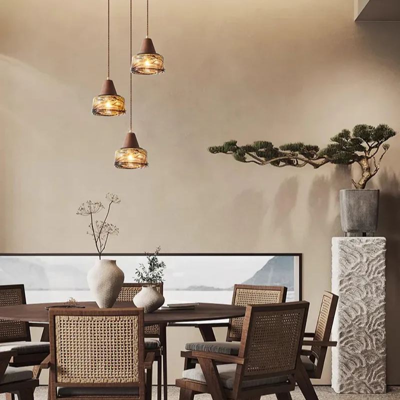 Dining room with Hailie pendant lights and wooden furniture