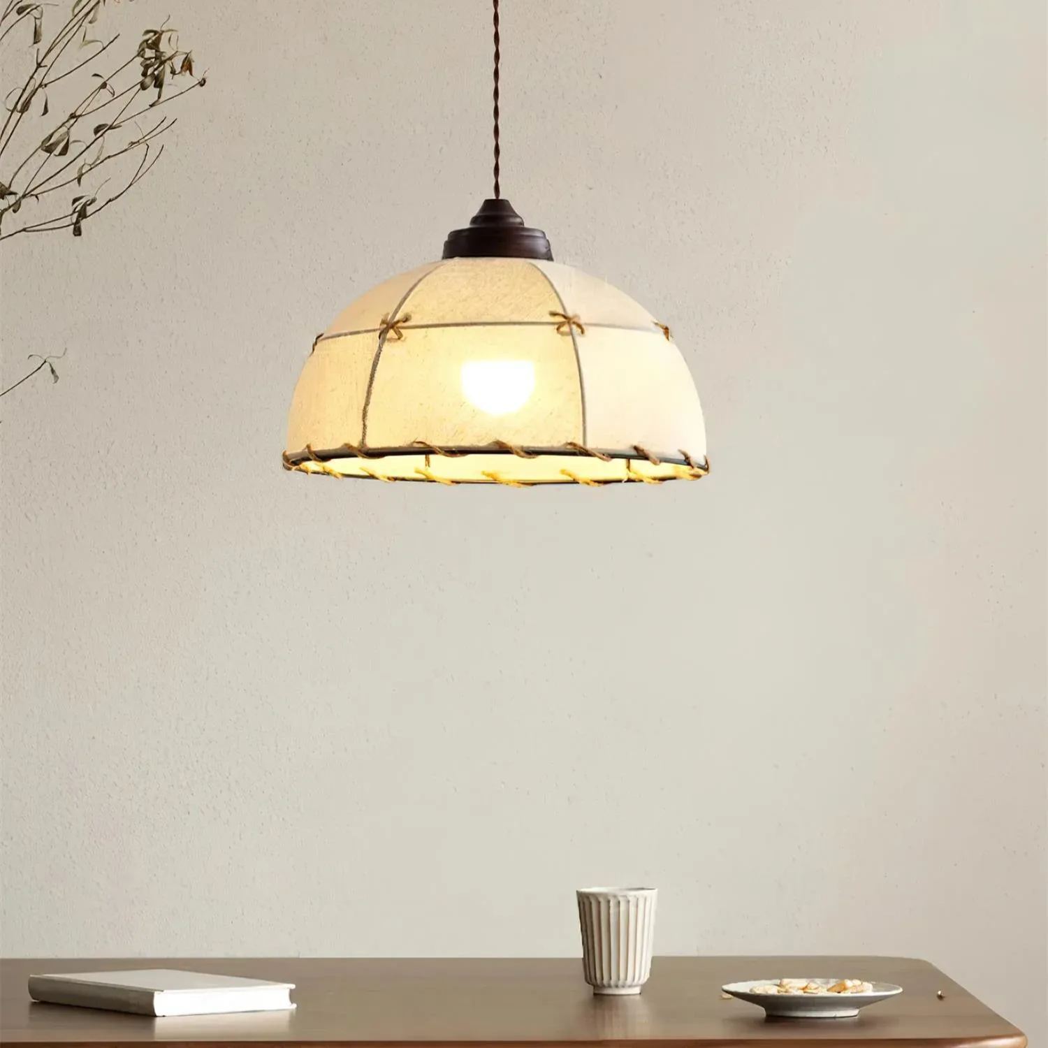 Vintage round pendant light over dining table