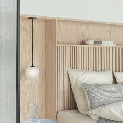 Modern bedroom with Hailie pendant light and wooden headboard