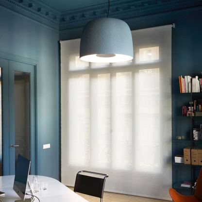 Modern Carins pendant light in a study room setting