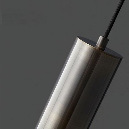Close-up of Meza cylinder pendant light detail, metal finish