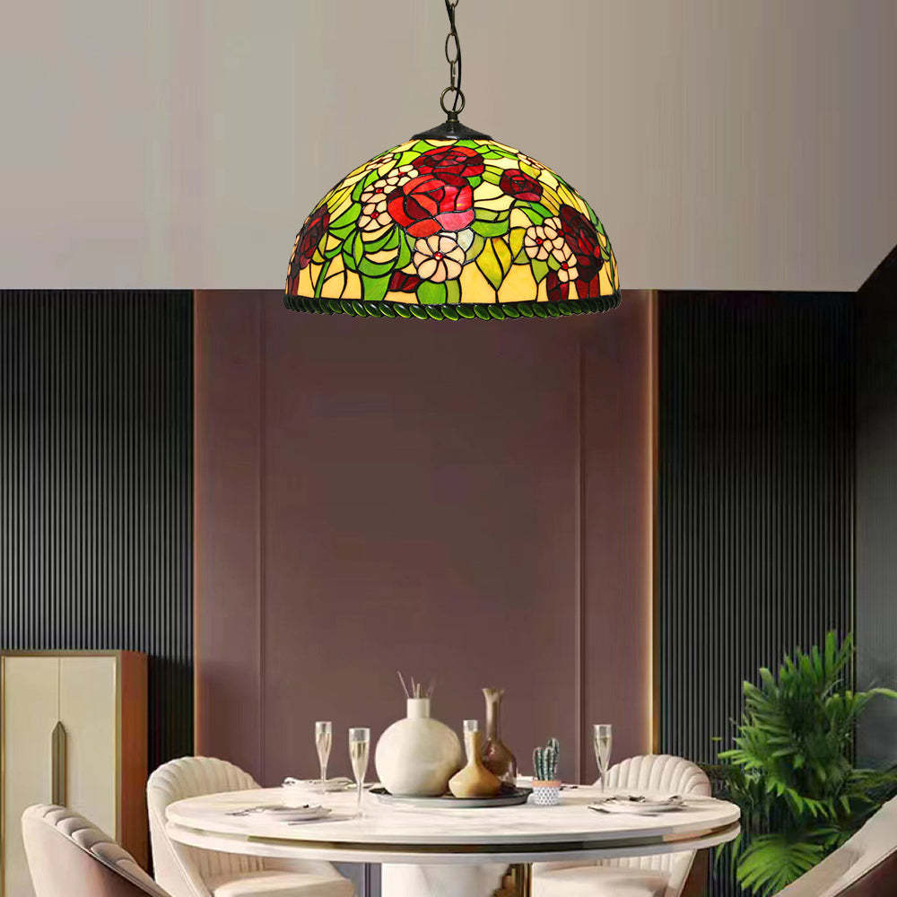 Colorful floral glass pendant light over dining table