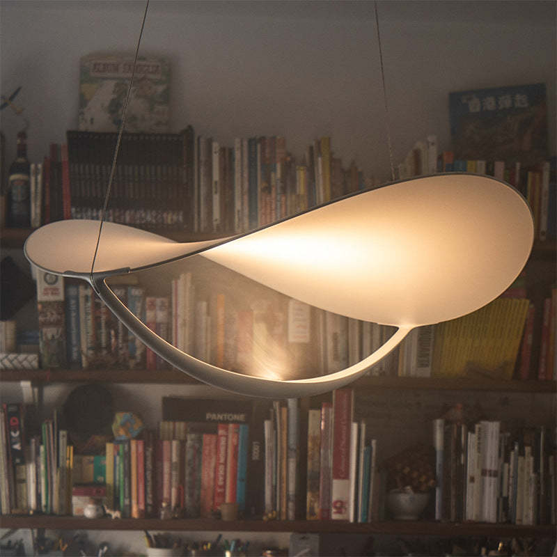 Cairns Art Pendant Light in Living Room with Bookshelf