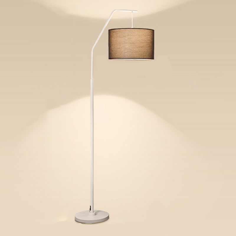 Eryn Cylinder Floor Lamp with arched design and fabric shade.