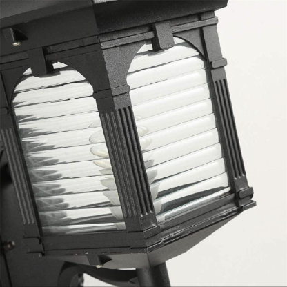 Close-up of Brady Vintage Outdoor Wall Lamp's glass and metal details.