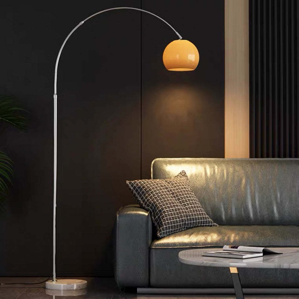 Salgado Floor Arc Lamp illuminating living room