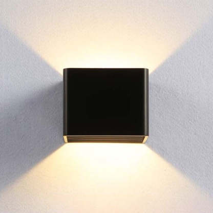 Orr Wall Lamp Square - Black metal wall light emitting warm light